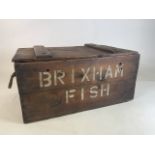 A vintage wooden fish box with rope handles and Brisbaneâ€™s Fish stencilled to front W:70cm x D: