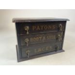 A set of retail wooden drawers for Patons boot and shoe laces. Patons logo to sides. W:39cm x D:25cm