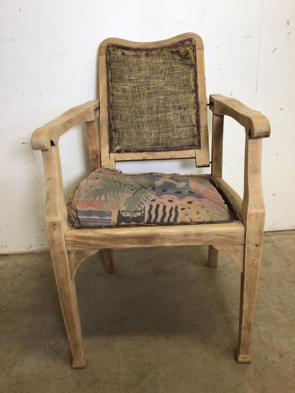 A beech wood arm chair with recling back for restoration. W:60cm x D:69cm x H:91cm