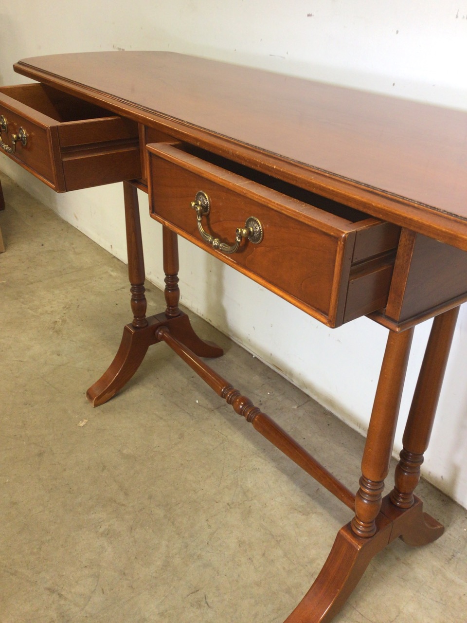 A 20th century French Cherry wood hall table with two drawers with brass handles, stretcher bar to - Image 2 of 5