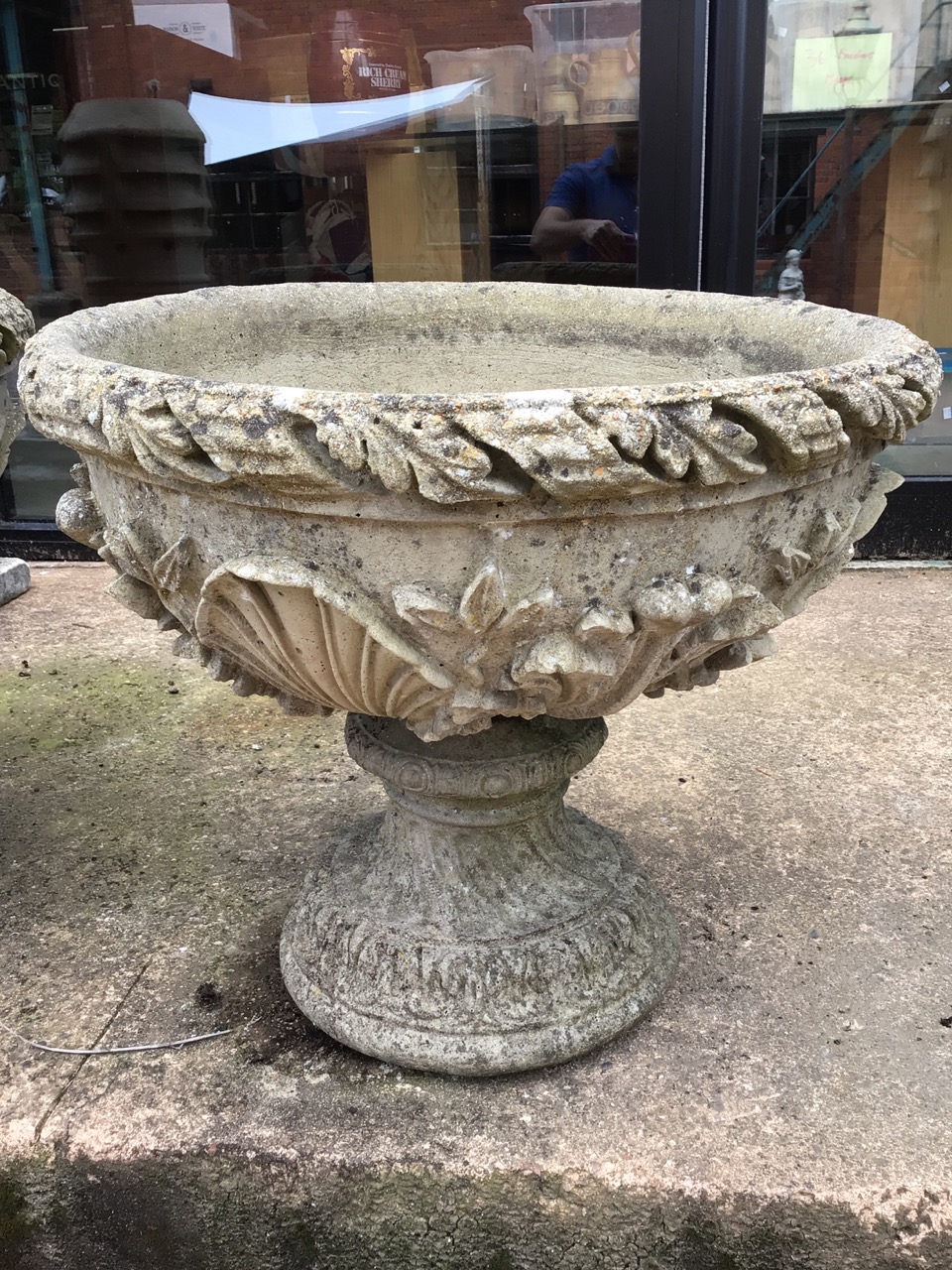 A pair of decorative circular reconstituted stone planters on separate plinths. W:53cm x D:53cm x - Image 2 of 5
