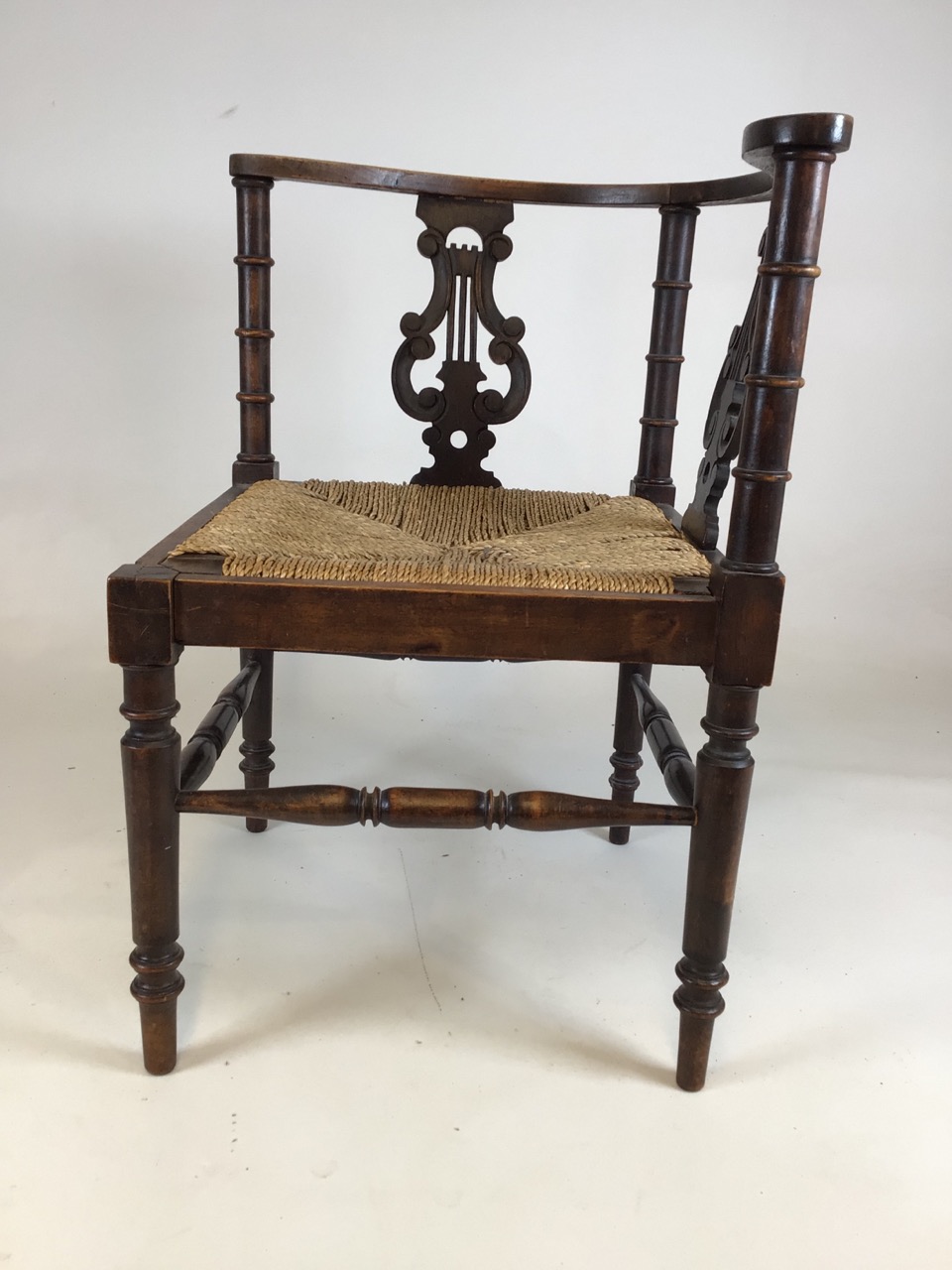 A 19th century rattan seated corner chair with curved back and lyre supports. W:61cm x D:61cm x H: - Image 2 of 6