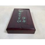 A vintage Mah-Jongg set in wooden box with characters to lid. Original score cards in side W:17cm