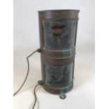 A vintage industrial twin light copper Stern ships lantern with original Meteorite applied makers