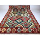 A Chobi Kilim rug. W:103cm x H:148cm