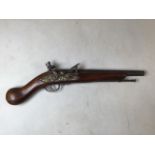 A decorative flint lock pistol. Walnut stock with inlaid decoration and gilt mechanism. 47cm