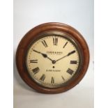 An Evans and sons Birmingham circular Fussee wall clock. Soho clock factory with oak case. Missing