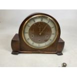 A mahogany arched case eight day clock with silvered dial