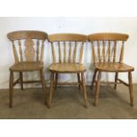 A pair of hardwood kitchen chairs and another. W:44cm x D:43cm x H:84cm