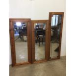 Three modern pine mirrors. Largest W:40cm x H:132cm.