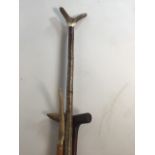 A shepherds crook also with various sticks.