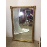 A 19th-20th century gesso gilt painted mirror. Damage to one corner see photos. W:80cm x H:125cm