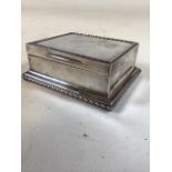 A sterling silver cedar lined cigarette box . by Stuart Dawson & Co London 1913. Gross. 13.8oz. W: