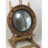 A reproduction gilt convex circular mirror. W:43cm x H:43cm