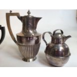 A silver plated tea set with other plated items.