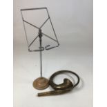 A brass horn and an adjustable music stand. Stand H:50cm