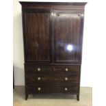 A Victorian mahogany inlaid linen press, with hanging rail and four drawers to base. W:121cm x D: