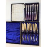 Two boxed sets of Silver handled and silver collared cutlery