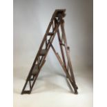 A small set of pine set ladders. The Hatherley Jones patent. W:74cm x D:47cm x H:104cm