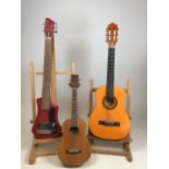 A small Hofner electric guitar H: 80cm A/F together with a Mitchell ukulele and a Palma guitar H
