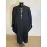 Two vintage graduation gowns. Made by Ede & Ravenscroft Ltd and J Whipple and son