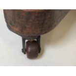 A Victorian inlaid davenport on ceramic castors with leather writing slope to interior desk. With