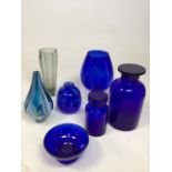 A collection of glassware including Two Bristol Blue lidded jars, a footed bowl and other items of