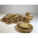A collection of Kiln Craft Ironstone pottery with green design together with some plain and