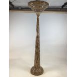 A large decorative resin jardiniere. D:51cm x H:177cm x W:51cm