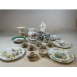 A collection of ceramics to include Royal Doulton lovers figurine, Four plates from the Country