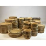 A huge amount of Kiln Craft Bacchus ironstone pottery, including dinner plate,s, tea plates, bowls