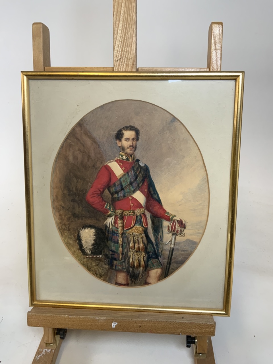 A framed watercolour of a Cameron Highlander signed W R Waters 1856W:34.5cm x H:39cm Frame
