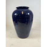 A large blue glazed pottery garden urn. W:43cm x D:43cm x H:62cm
