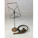 A brass horn and an adjustable music stand. Stand H:50cm