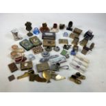 Assortment of smoking paraphernalia to include Vestas, matchbooks and an unusual Duty Token