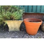 A large square planter also with a terracotta plant pot. W:48cm x D:48cm x H:36cm