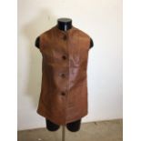 A World War II ATS leather despatch riders jerkin. Labelled H Winter 1942, size No 4 Height 5ft