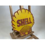 Vintage Shell petroleum emblem, likely used atop a petrol pump in period. Full-colour relief