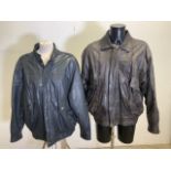 Two mens leather bomber jackets. One vintage navy blue St Michael (Marks and Spencer) jacket size