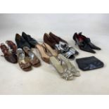 A collection of ladies and mens vintage shoes and a clutch bag