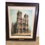 A large coloured etching of a cathedral in antique frame signed W Monk. W:79cm x H:97cm