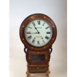 A Harris eight day wall clock with marquetry design. Untested W:42cm x H:70cm