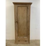 A Victorian pitch pine single wardrobe with drawer to base. W:77cm x D:36cm x H:205cm