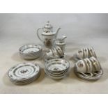 A Royal Doulton Coffee set for six including cups, saucers, Two sets of bowls, a ug and five tea