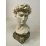 Heavy male portrait bust in the classical manner, presented upon solid marble base.