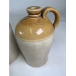Pottery alcohol flagon marked Bristol with a monk decanter