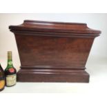 A large Georgian sarcophagus mahogany cellarette C.1810 with lead lined interior. W:74cm x D: