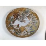 MICHAEL & JOANNA MOSSE for Llanbrynmair Pottery; an earthenware charger decorated with a unicorn,