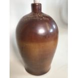 A pottery wine flagon from the Fountain Inn Northampton, converted into a lamp. W:25cm x D:25cm