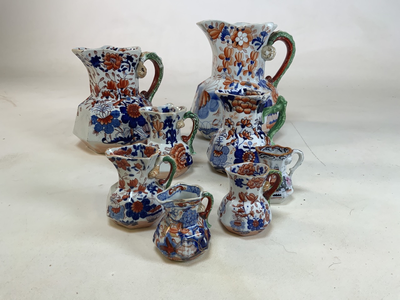 A collection of eight Masons ironstone jugs, the largest being 25cm the smallest smallest 7.5cm